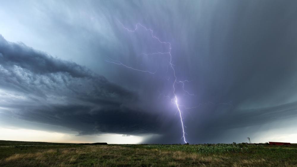 Lightning strike in field wallpaper - backiee