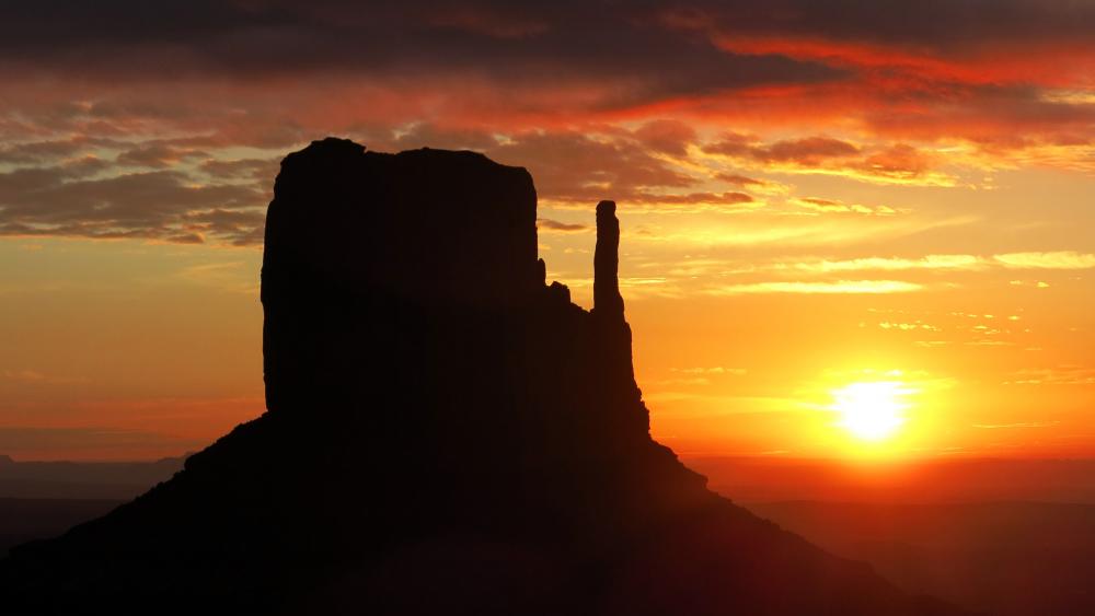 West Mitten Butte silhouette in the sunset (Monument Valley) wallpaper