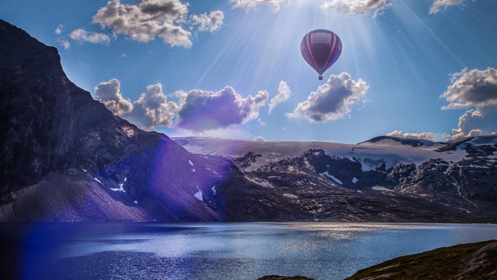 Hot air balloon in the rays wallpaper