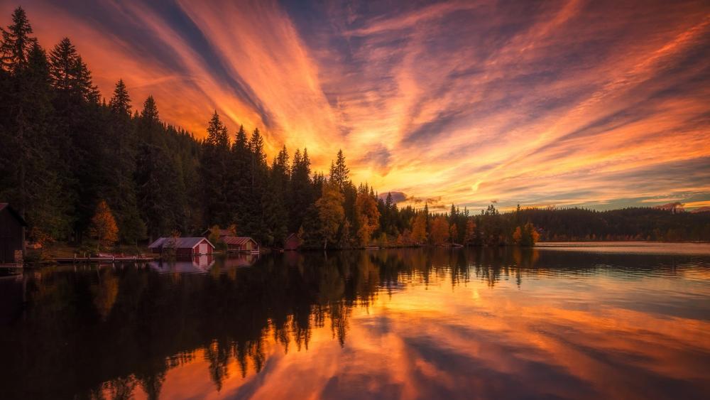 Red boathouses in the sunset wallpaper