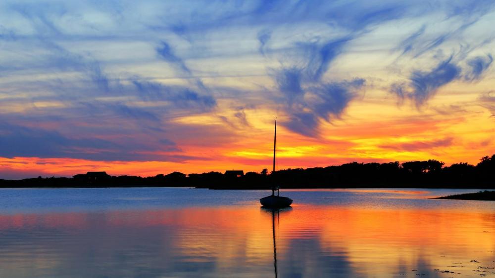 Sailboat at sunset wallpaper