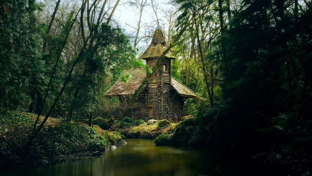 Wooden cottage in a deep forest wallpaper