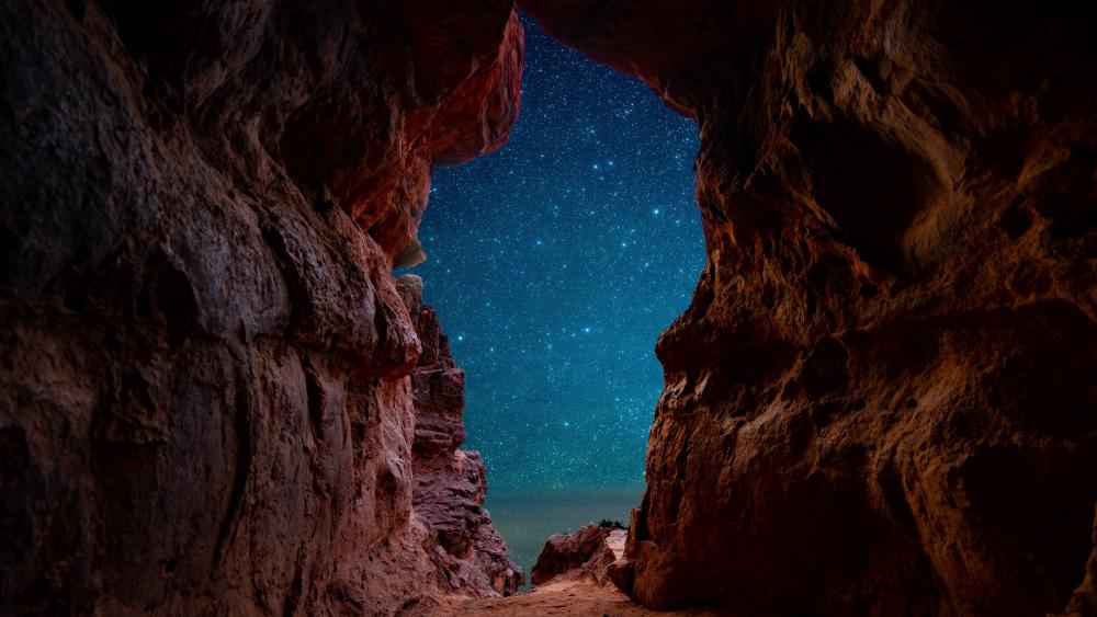Starry sky from a sea cave wallpaper