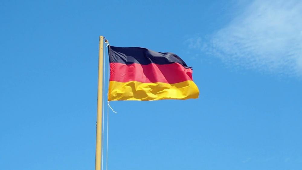German flag on the blue sky wallpaper