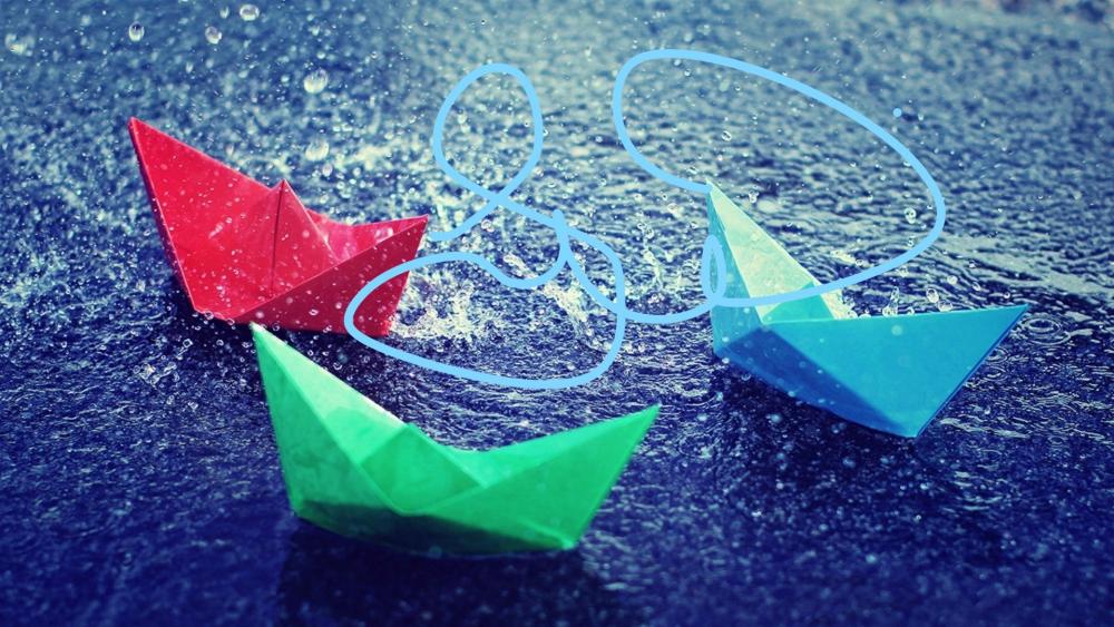 Colored paper boats in the rain wallpaper