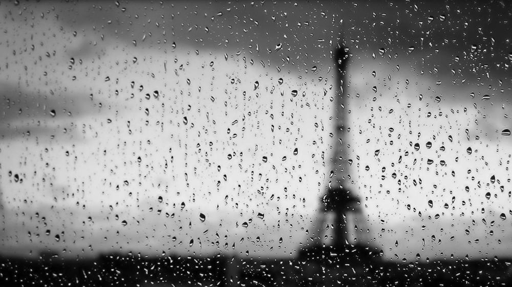 Blurry Eiffel Tower on a rany day monochrome photo wallpaper
