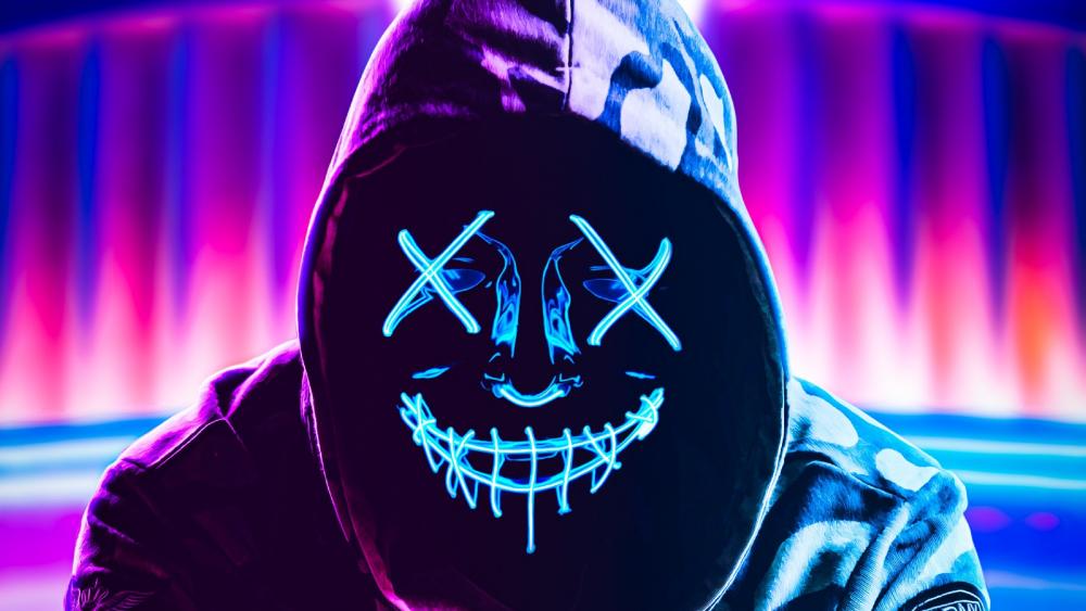 Download A Person Wearing A Neon Mask With A Hoodie Wallpaper