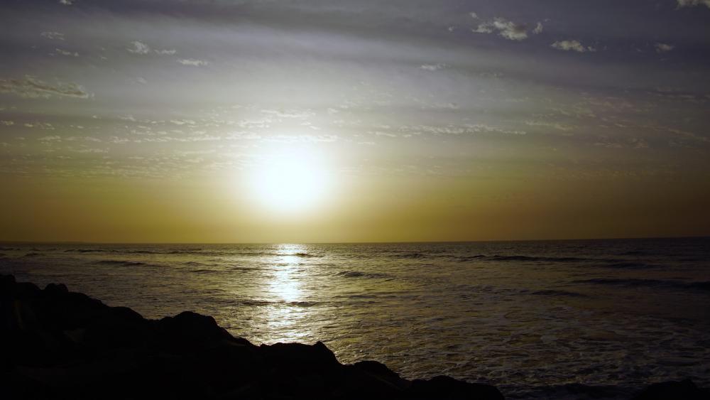 Sunset by the sea in Banjul, Gambia wallpaper