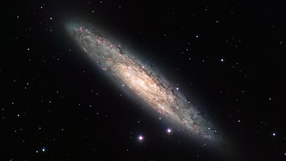 Spiral galaxy NGC 253 wallpaper