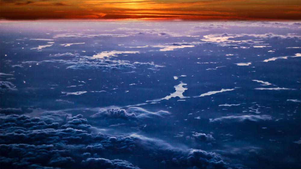 Sunset above sky wallpaper