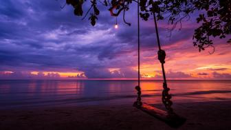 Swing at sunset wallpaper