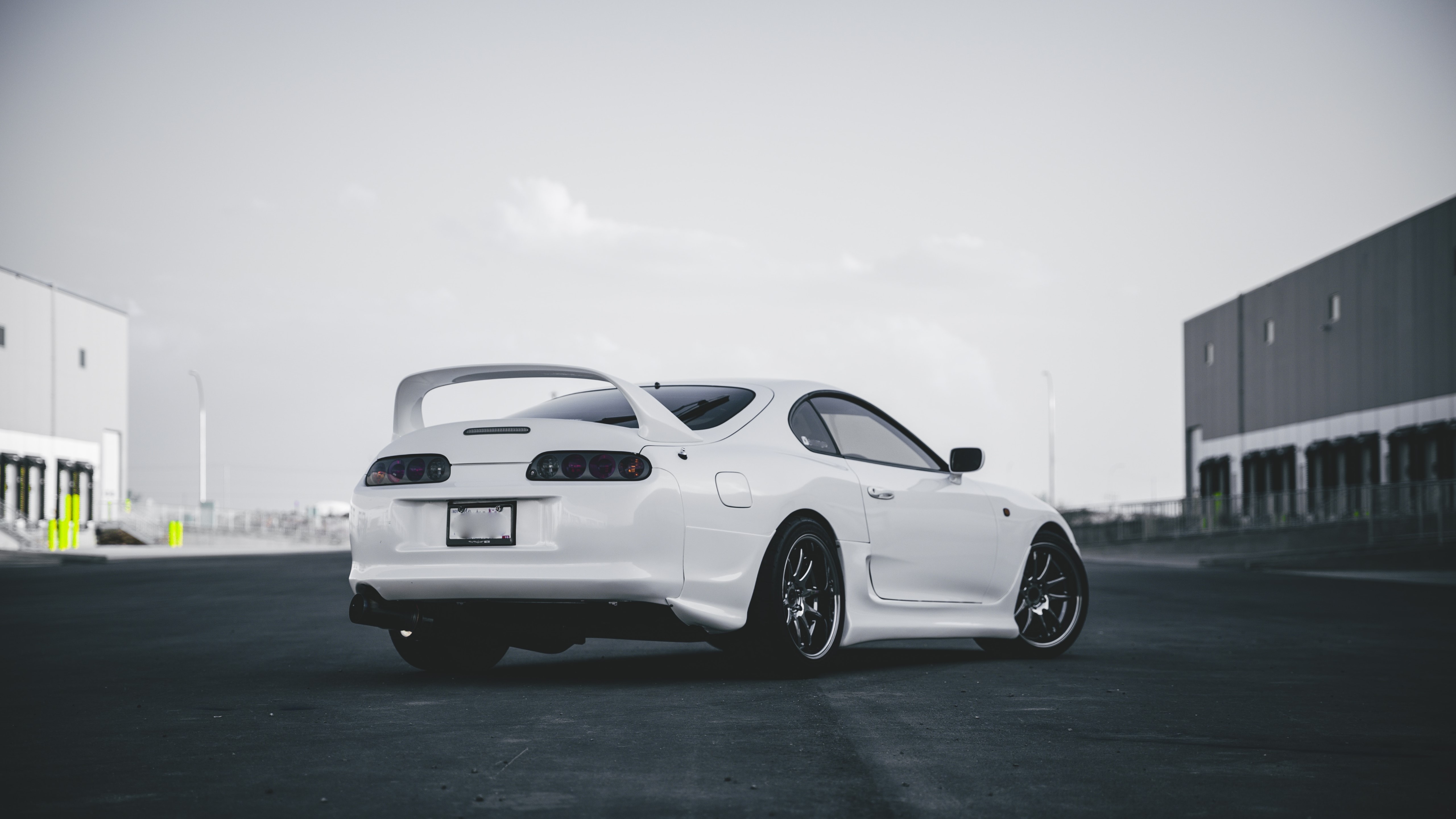 Sleek White Toyota Supra Sports Car Dominance - backiee