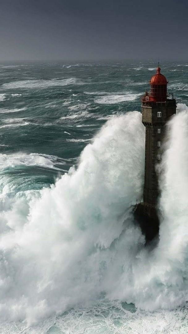 The Lighthouse Of La Jument During Storm Backiee