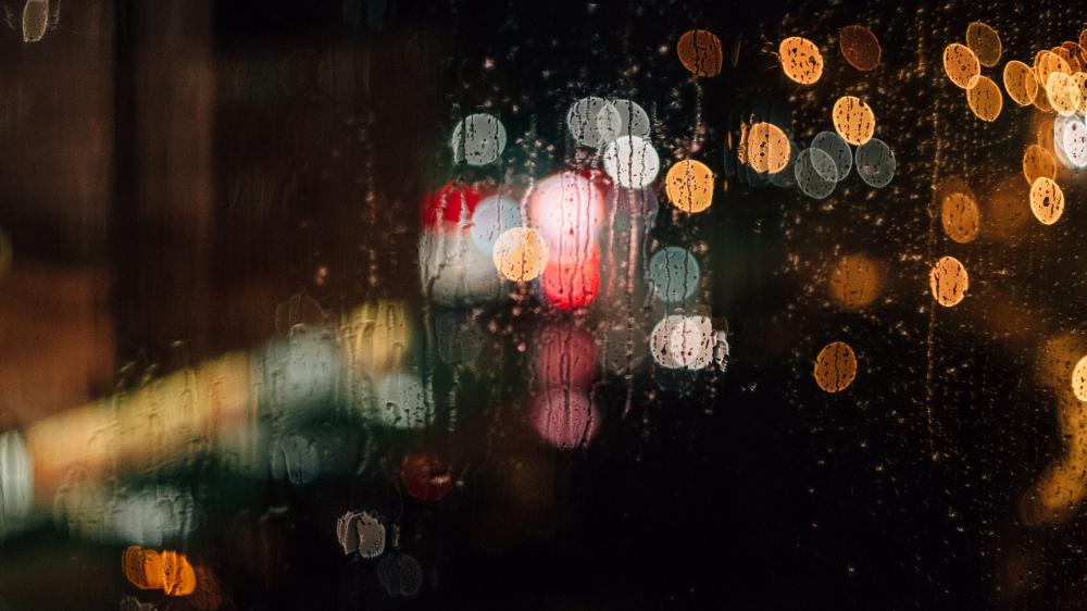 Night drizzling and bokeh lights wallpaper