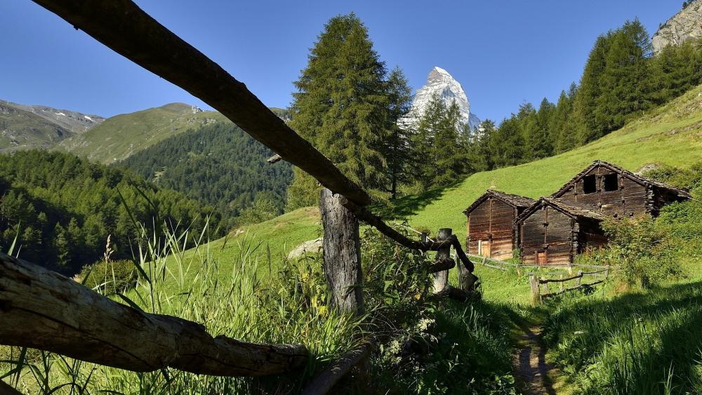 Wooden house and the Matterhorn peak wallpaper