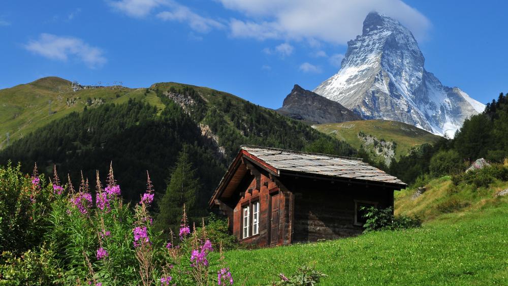 Log cabin and the Matterhorn wallpaper