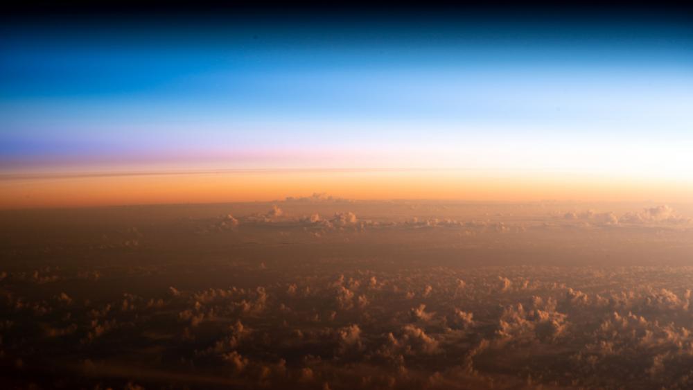 NASA-Sunrise Over the Pacific wallpaper