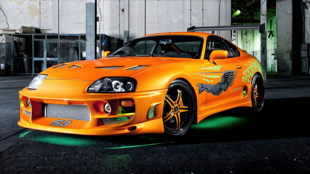 Sleek Orange Toyota Supra Sports Car at Night wallpaper