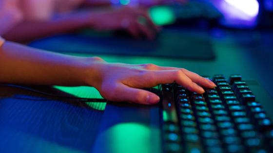 Close up of robot and human hands typing on keyboard at table in room.  Generative AI. 25536177 Stock Photo at Vecteezy