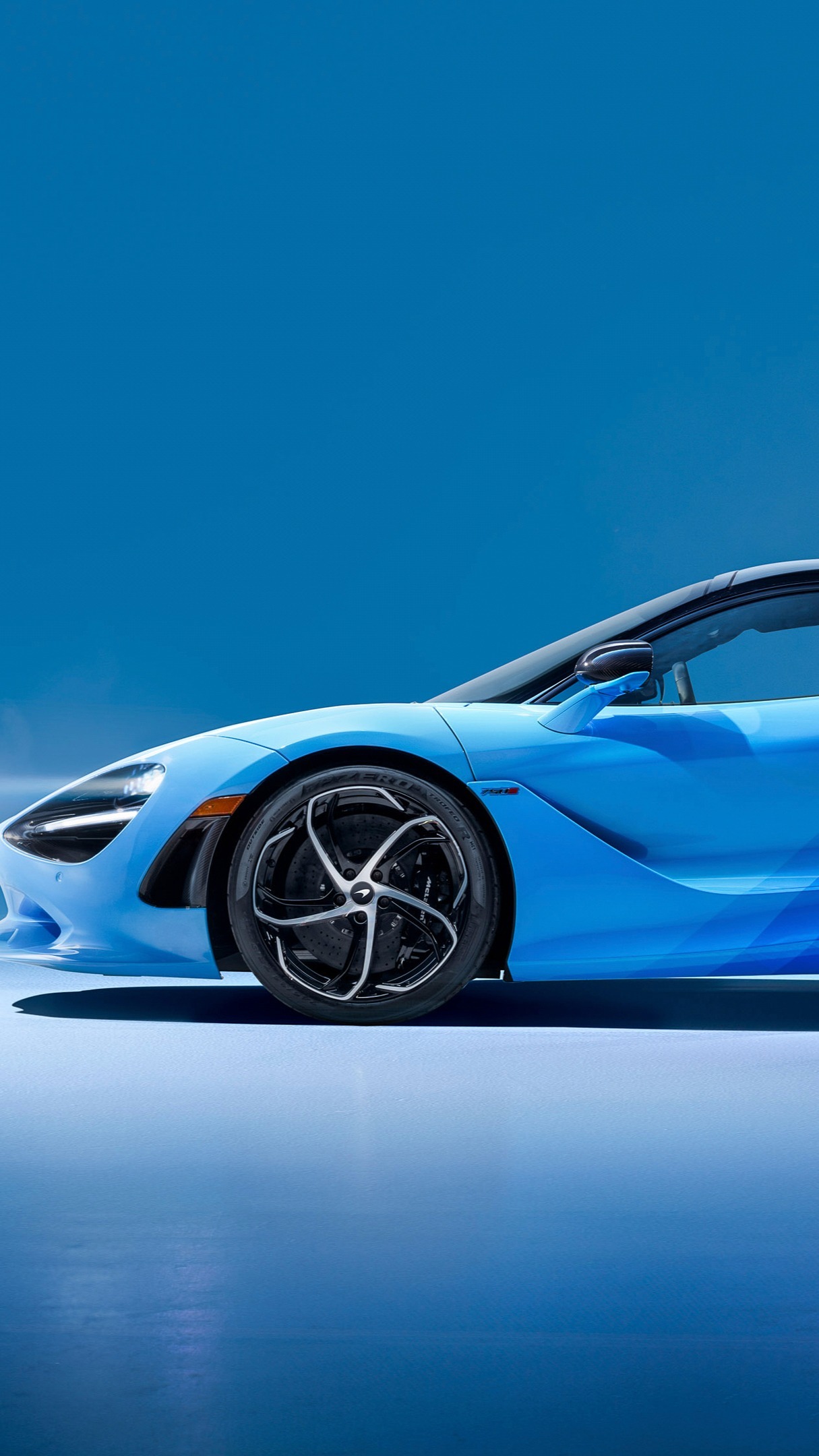 Sleek Blue McLaren 750S Supercar Elegance - backiee